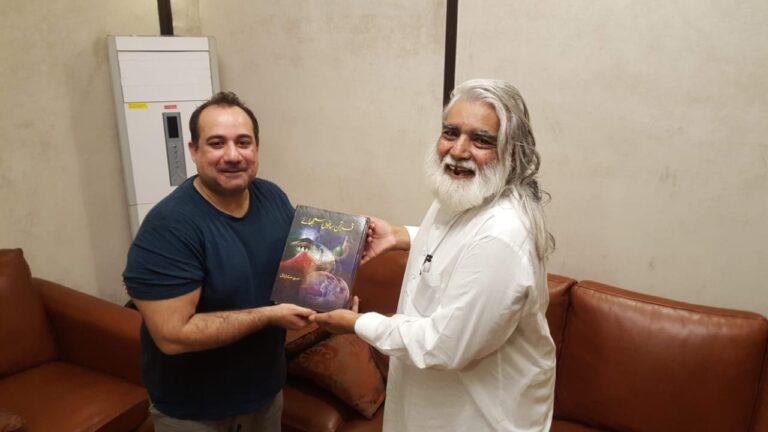 Allama Khurshid Kamal was with Rahat Fateh Ali Khan presenting Quran Pak